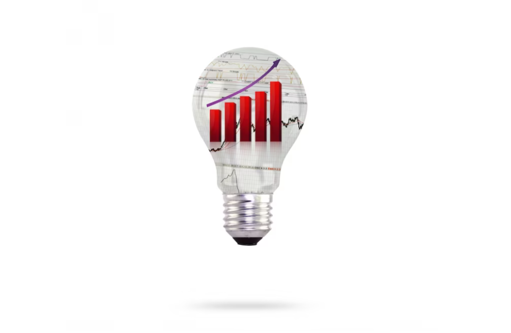 A lightbulb with a transparent graph of red bars showing growth