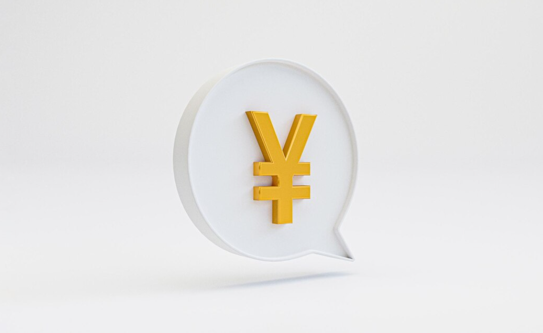 A 3D yen symbol inside a speech bubble against a white background